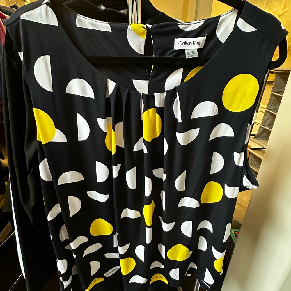 Sleeveless Calvin Klein Navy Cami with Yellow and White geometric print.